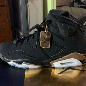 Black and gold size 12 Air Jordan 6